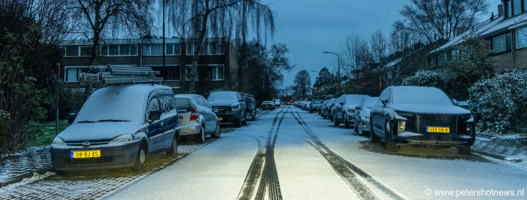 Sneeuw in Nederland, witte plaatjes en code geel om gladheid