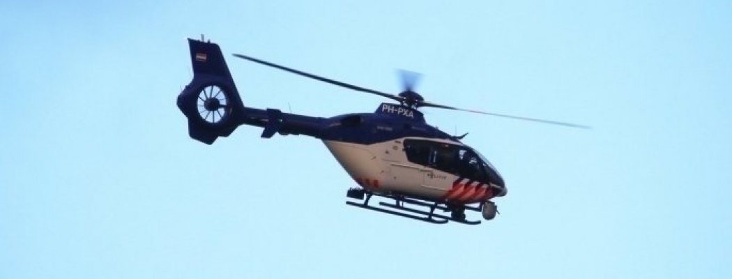 Politiehelikopter boven Mijdrecht ivm inbraak (oefening)