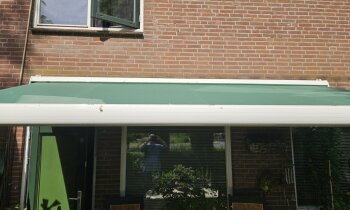 Te Koop: Groot Knikarmscherm